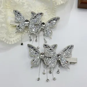 Crystal rhinestone butterfly hair clips with elegant tassel drops, sparkling side hair accessories.