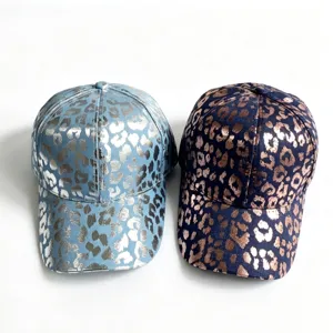 Metallic leopard print denim baseball hat, fashion curved brim sunshade cap detail view.