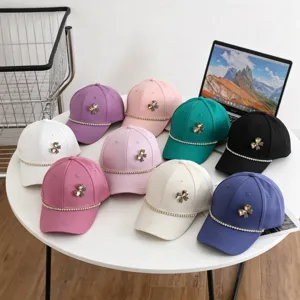 Kids baseball cap featuring rhinestone bow and chain detail, colorful casual sun hat for spring.