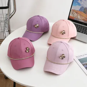Kids baseball cap with rhinestone bow and chain decoration, casual summer sun visor hat.
