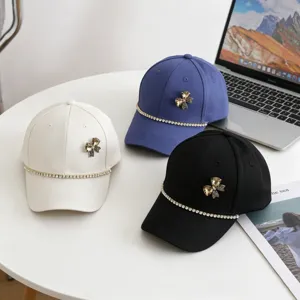 Kids baseball cap with rhinestone bow and chain, casual sun hat for spring and summer seasons.