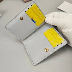 Kompakte Damen Kurzbrieftasche Mini Kartenhalter stilvolles PU Leder Portemonnaie Knopf.