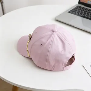 Pink children baseball cap with rhinestone bow and chain decoration for spring summer.