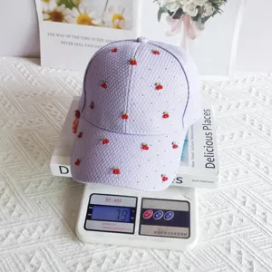 Lavender waffle baseball cap with cherry and rhinestone details, perfect for sweet summer styles.