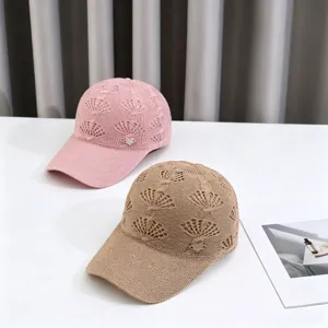 Knit hollow baseball cap with diamond love logo, breathable sunshade hat for outdoor use.