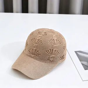 Hollow knitted baseball cap with rhinestone heart badge, breathable summer sunshade hat.