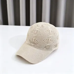 Breathable hollow knitted baseball cap with rhinestone heart for outdoor sun protection.