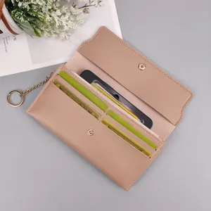 Women's long solid color wallet with snap closure, multi card slots and chic keychain.
