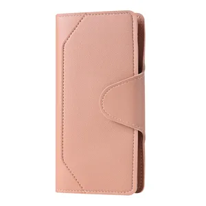 Detailed view of pink women long wallet featuring snap closure and fine stitching.