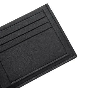 Black leather wallet detail card slots premium minimalist mens pocket accessory close-up