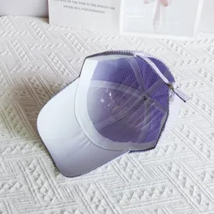 Detailed close-up view of the purple waffle baseball cap interior lining and metal buckle.