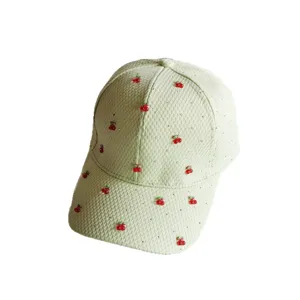 Mint green waffle baseball cap with rhinestones and sweet red cherry decorations for summer.