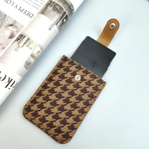 Houndstooth pull-out card holder detail shot, multi-slot slim wallet with snap closure