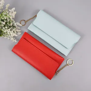 Women long wallet stylish solid color pu leather purse with metal chain keychain detail view.