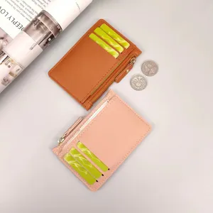 Detail view of PU leather cardholders with multiple slots and zipper coin pocket design.