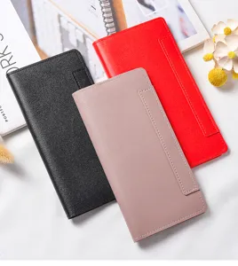 Detailed view of women's long wallet featuring minimalist design, multiple card slots and snap closure.