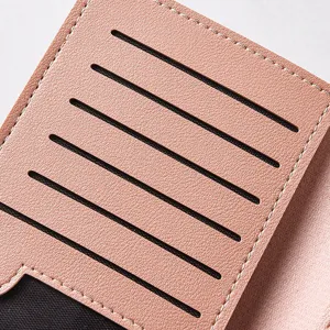 Pink PU leather wallet interior card slots detail view, neat stitching, minimalist style.