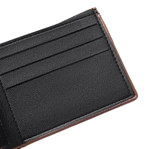Close-up detail of black leather wallet interior with multiple card slots and contrast stitching.