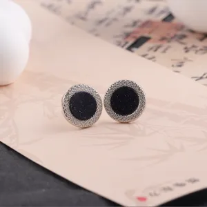 Classic round blue sandstone stud earrings with textured silver bezel for daily fashion style.