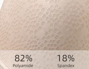 Detailed view of breathable bra fabric texture showing high-quality nylon and spandex blend.