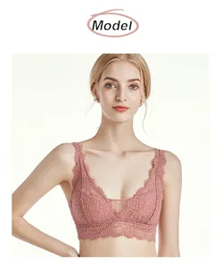 French breathable lace wireless bra detail shot in soft pink, elegant intimate apparel design.