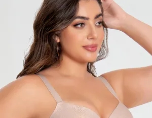 Plus size beige bra detail showing soft texture, wide comfort straps, and full cup support.
