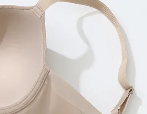 Plus size women bra detail shot showing breathable mesh fabric, wide shoulder straps and full cup.