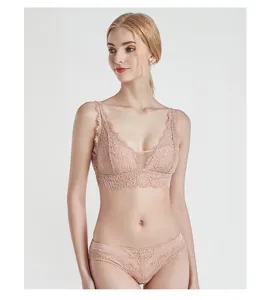 Detailed view of the elegant french lace wireless bra and panty set in nude pink tone.