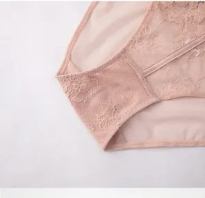 Detailed close-up of women's mid-waist lace briefs featuring soft cotton mesh panels.