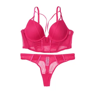 Hot pink sexy bustier lingerie set with bra and thong, featuring boned mesh design.