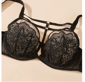 Plus size black lace bra with sheer mesh and trendy strappy details for everyday wear.