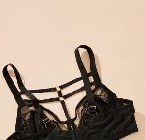 Detailed close-up view of the black lace back strap bra showing the intricate multi-strap design.