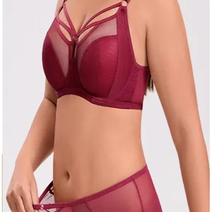 Plus size full cup bra and panty set with mesh panels and supportive straps for women.
