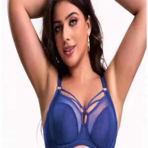 Details of the plus size blue bra showing supportive straps and delicate cups.