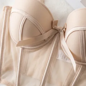 Beige corset bustier bra featuring mesh boning and satin bow elegant women lingerie