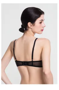 Back view detail of a black french lingerie bra featuring adjustable straps and sheer mesh band.