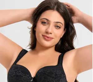 Close-up detail of the black lace full cup bra featuring wide supportive straps and bow decor.
