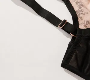 Detail view of plus size bra strap and back hook design, breathable mesh fabric for comfort.