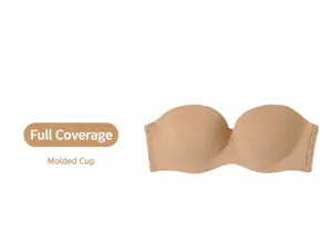 Vista dettagliata del reggiseno senza spalline, coppe modellate e tessuto color carne.