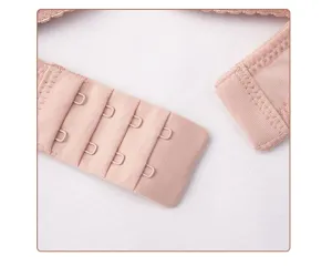 Close-up detail of women's comfortable bra back hook-and-eye closure with soft fabric.