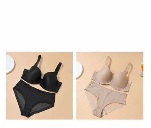 Plus size full cup bra and panties set in black and nude, breathable and supportive design.