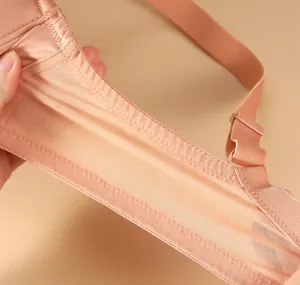 Close-up of breathable mesh bra side wing, showing fine stitching and comfort detail.