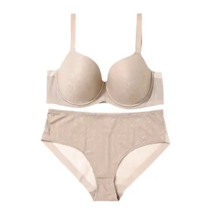Comfortable push-up bra and panty set for women, breathable full-cup lingerie in nude color.