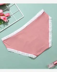 Cotton mid-waist women's briefs with delicate white lace trim solid pink detail photo