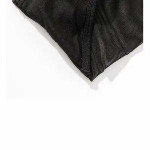 Close-up detail view of black breathable mesh fabric and fine stitching for women underwear.