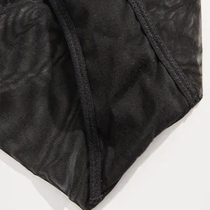 Close-up detail of black mesh breathable women underwear fabric with fine stitching.
