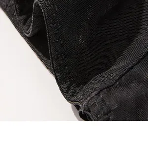 Detailed close-up of women's breathable black mesh underwear elastic waistband texture.