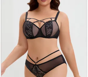 Plus size sexy black lace bra and panty set with stylish strap design for comfortable wear.