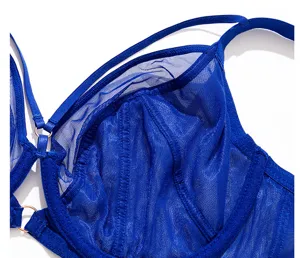 Blue sheer mesh bra detail view, thin straps, supportive plus size undergarment.