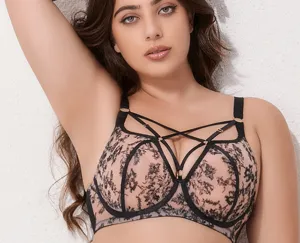 Detailed closeup of plus size floral lace push up bra with strappy design for full support.